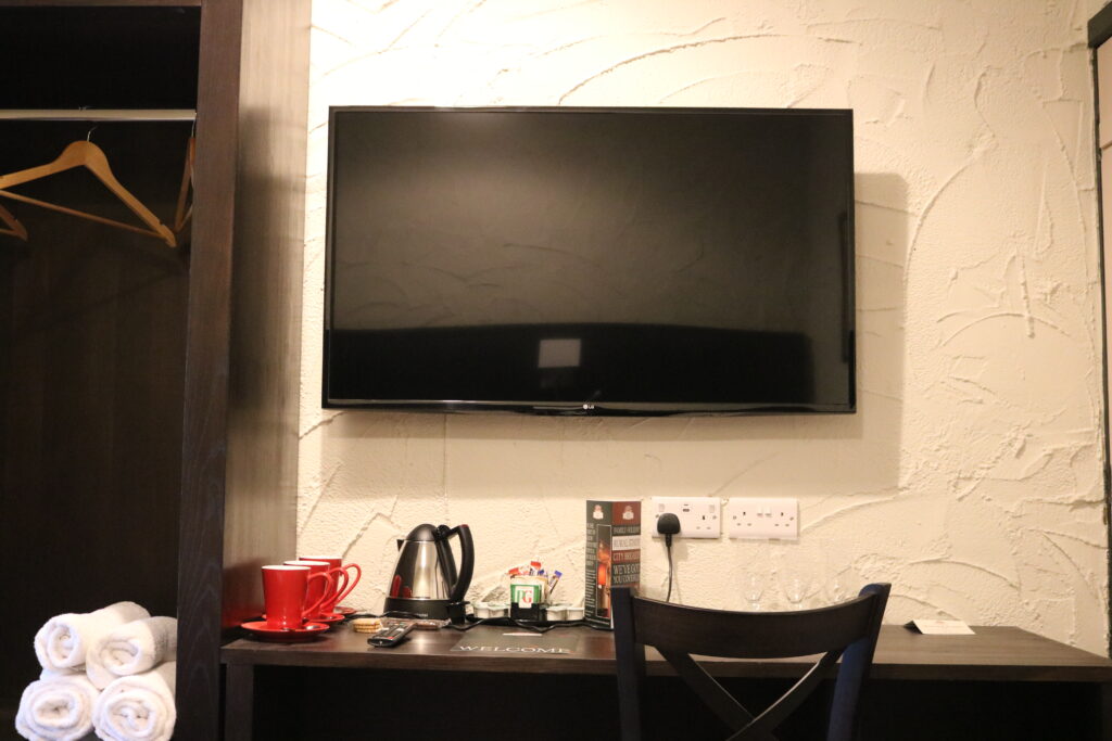 TV with tea and coffee facilities.