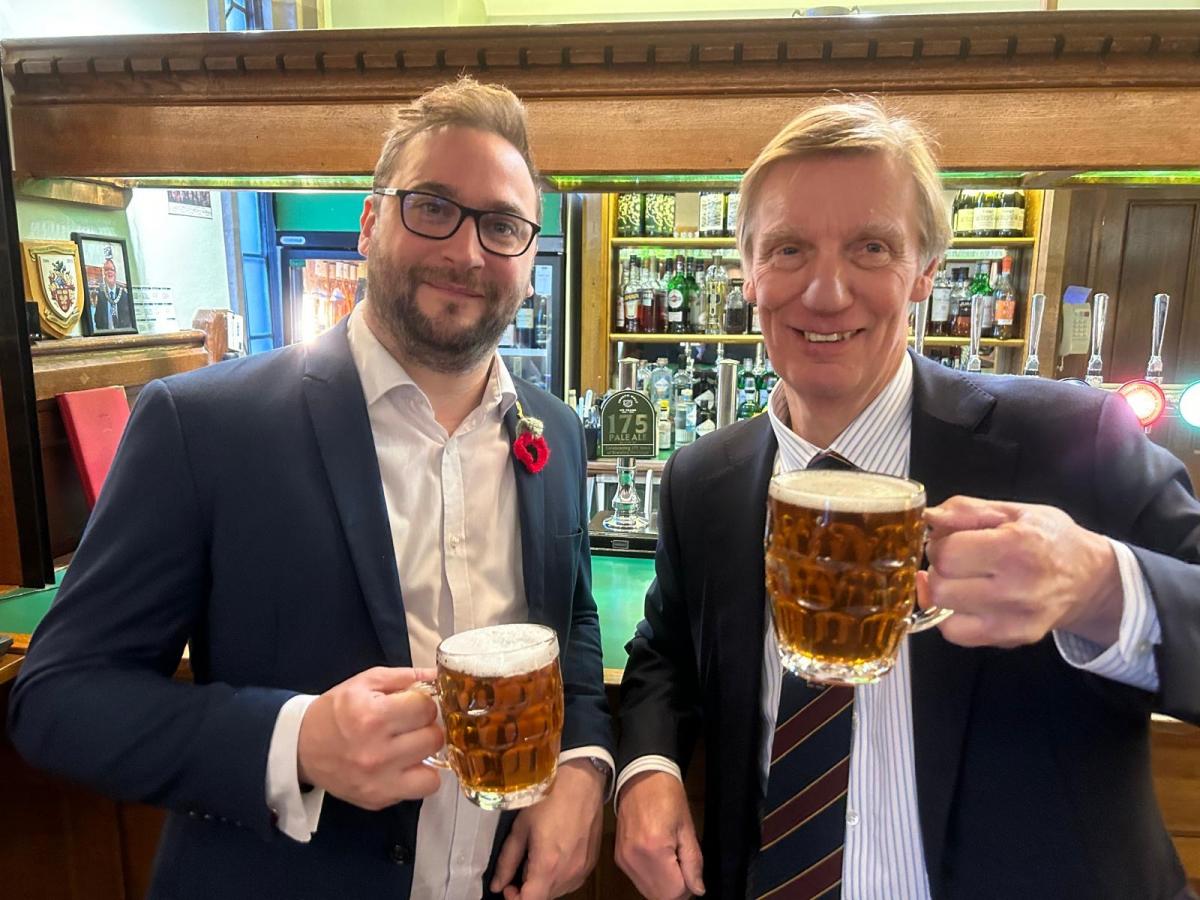 Richard Kershaw and an MP holding our 175 ale.