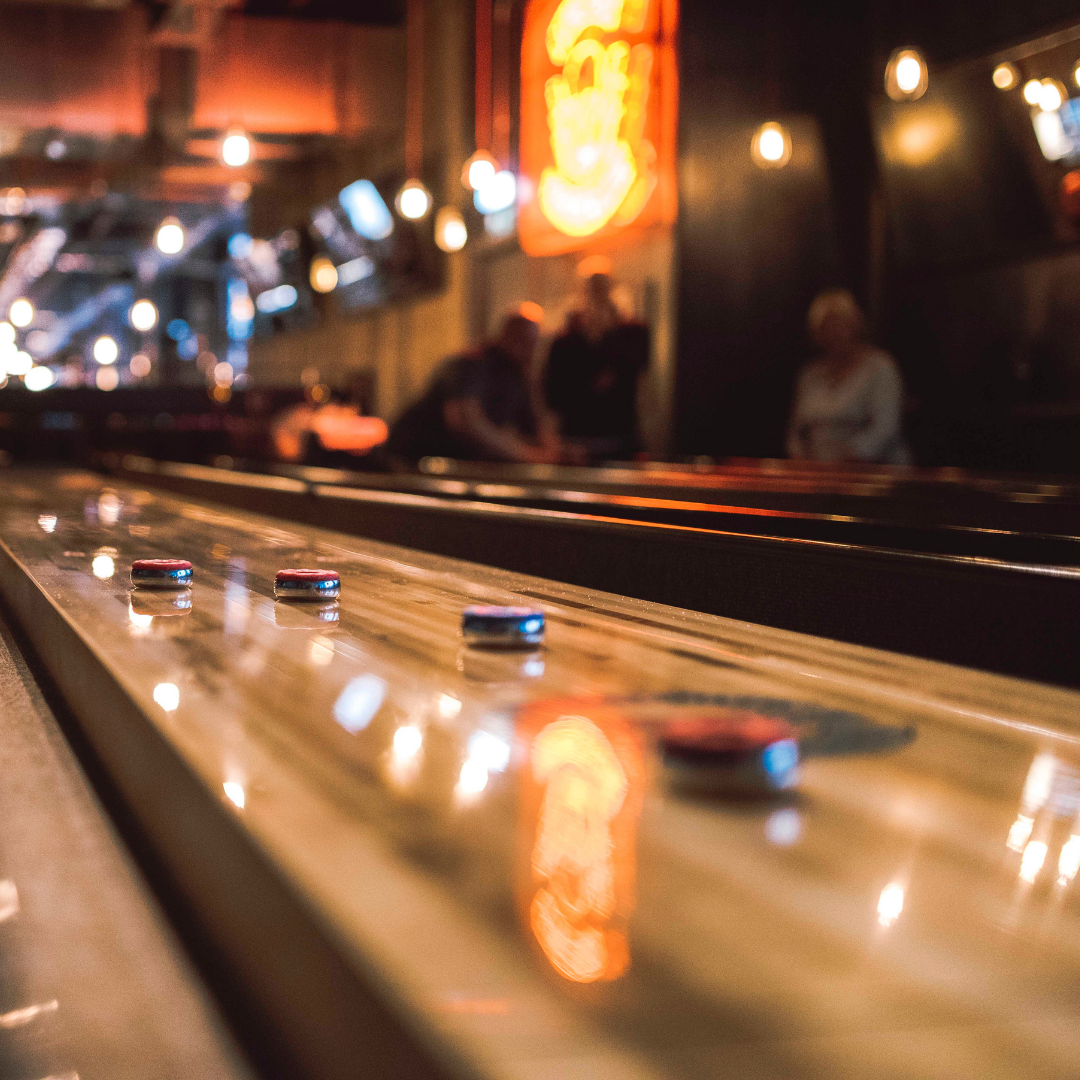 A shuffleboard under lights